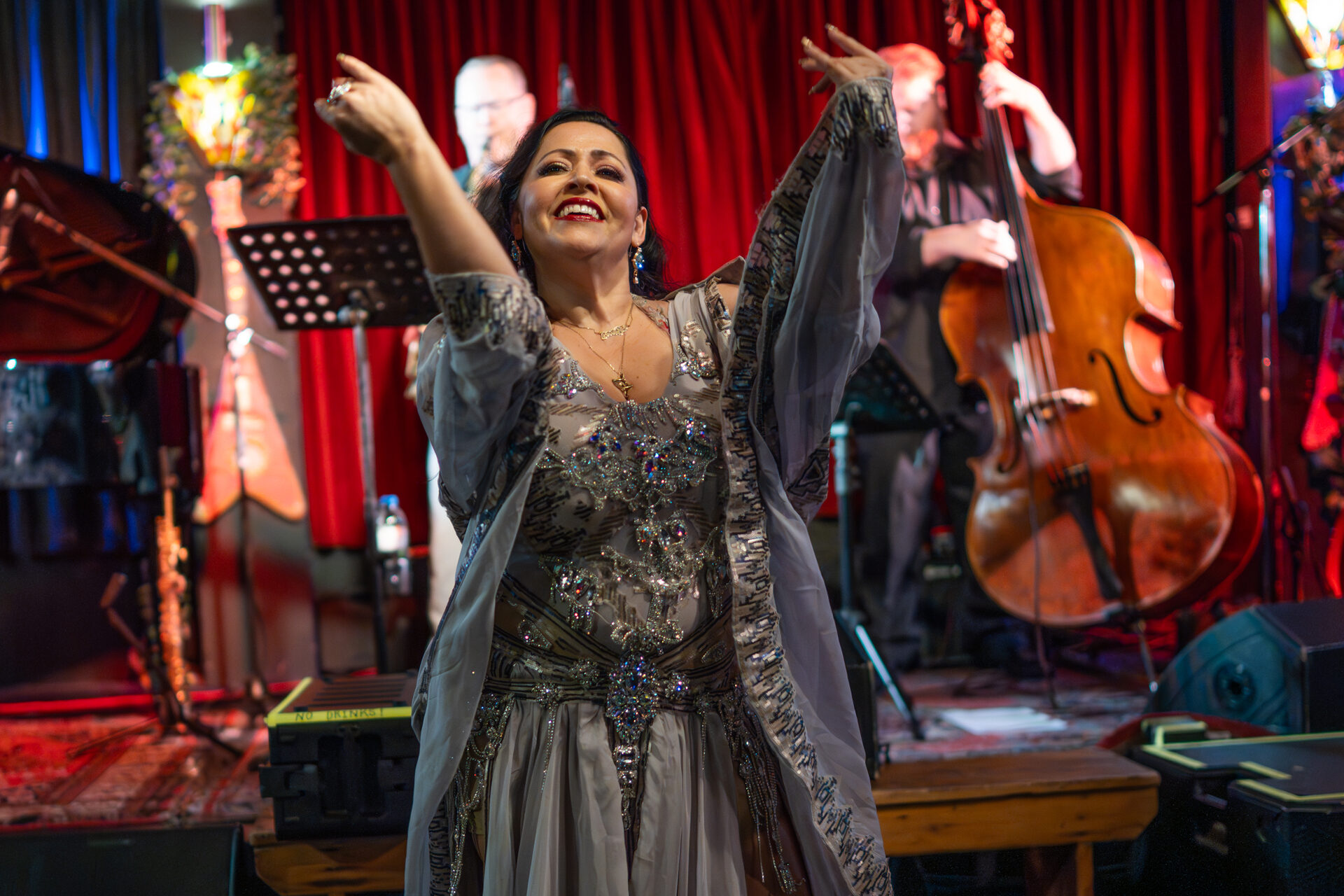 Jrisi performing live with the Devi Band