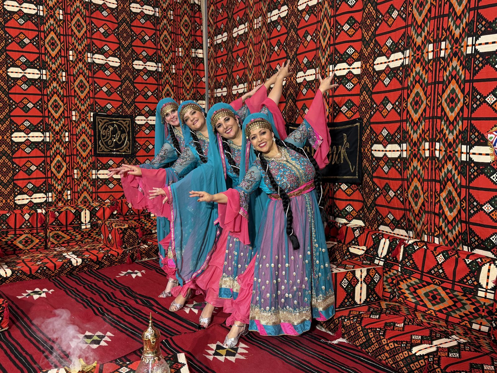 Hathor Iranian Dance Ensemble in teal and pink costume