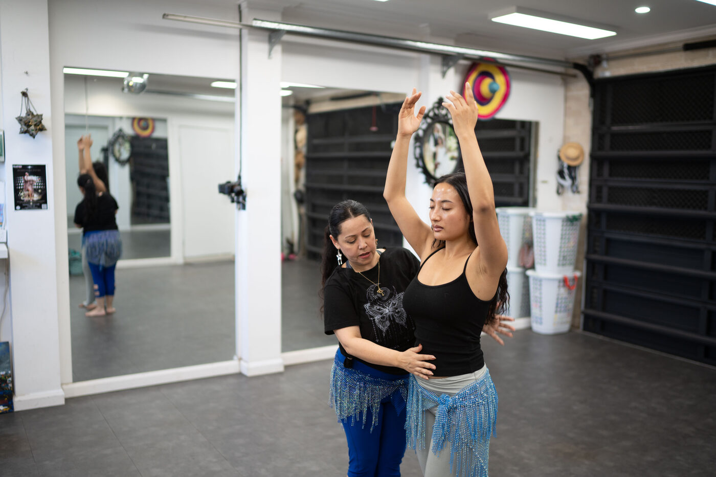 Jrisi guiding a private student through a class at the Winston Hills home studio
